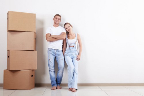 Man and van service introduction in Queens Park with moving boxes and furniture