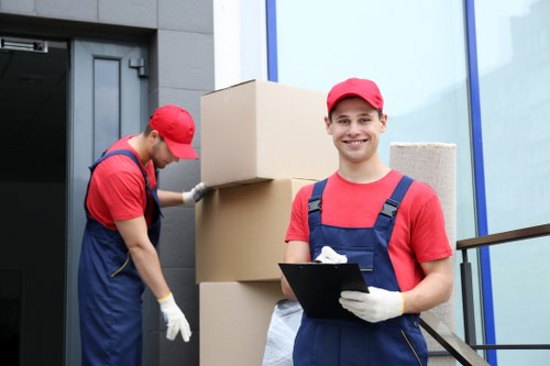 Moving van and removals team serving homes in Queens Park