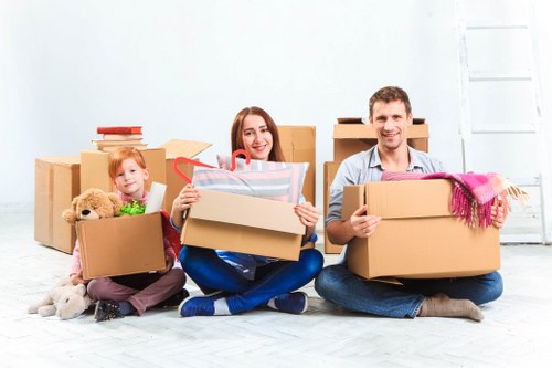 Careful handling of household items during a Queens Park move