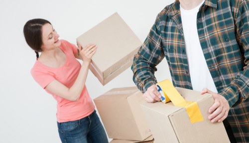 Removal boxes and household items prepared for a Queens Park relocation