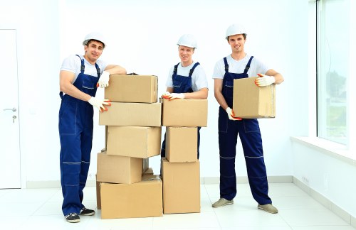 Urban relocation assistance in Queens Park with a van and mover